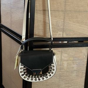White and Black small purse.